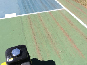 Removing-Bubbles-Tennis-Surface-Scarifying